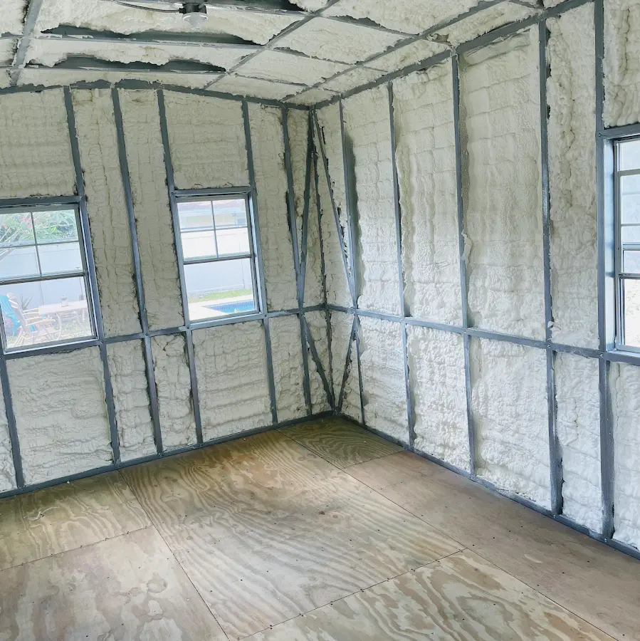 Closed-cell spray foam insulation applied to wall cavities in a residential project in Washingtonville